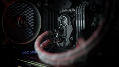 Detailed view of a computer's cooling system showcasing advanced technology with illuminated components.
