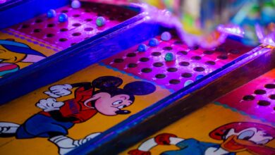 Vibrant arcade game featuring iconic cartoon characters under colorful lighting.