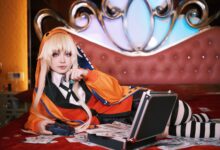 Cosplayer in vibrant outfit lounging on bed with game controller and cash, creating a playful scene.