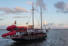 Scenic view of a pirate-themed ship during sunset in Arraial d'Ajuda, Brazil.
