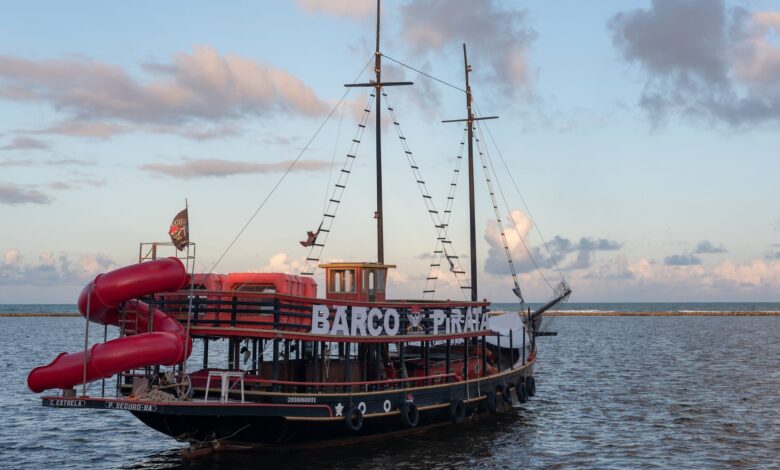 Scenic view of a pirate-themed ship during sunset in Arraial d'Ajuda, Brazil.