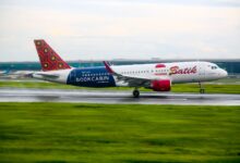 Batik Air Airbus A320 landing on a runway in Banten, Indonesia, showcasing aviation and travel.