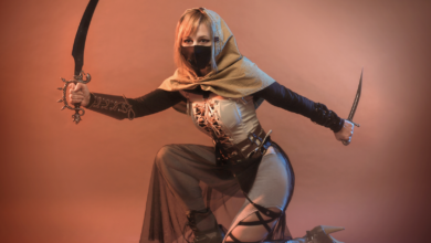 A female warrior in detailed fantasy cosplay, wielding weapons in a studio setting.