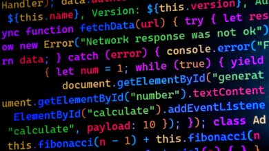 Close-up of colorful JavaScript code displayed on a computer monitor, ideal for tech-themed projects.