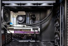 Interior view of a gaming PC showcasing a GeForce RTX graphics card and high-performance cooling system.