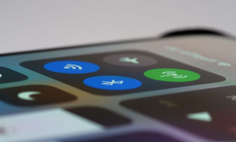 Detailed view of a smartphone control center showing wireless icons, perfect for tech-related topics.