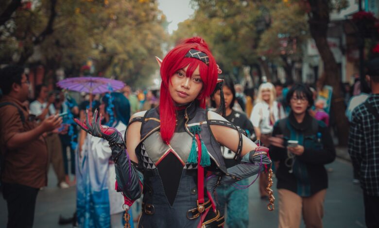 Colorful cosplay character poses at a lively outdoor street festival, showcasing fantasy costume details.