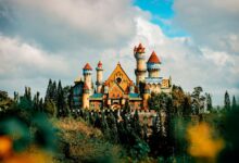 Colorful castle exterior with decor among trees in amusement park in Province of Batangas Philippines