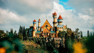 Colorful castle exterior with decor among trees in amusement park in Province of Batangas Philippines