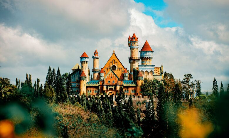 Colorful castle exterior with decor among trees in amusement park in Province of Batangas Philippines