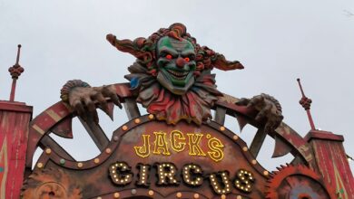 Creepy clown decoration at Jack's Circus entrance, perfect for horror themes.