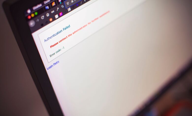 Close-up of a computer screen displaying an authentication failed message.