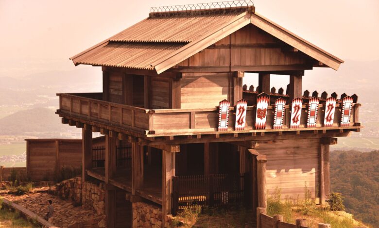 Explore the serene traditional Japanese wooden temple on a hill, capturing historic architecture and culture.