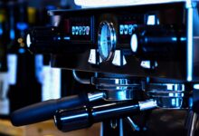 Stylish close-up of a professional espresso machine, ideal for coffee enthusiasts and cafe scenes.