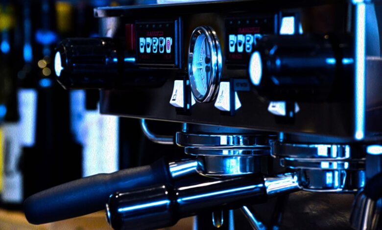 Stylish close-up of a professional espresso machine, ideal for coffee enthusiasts and cafe scenes.