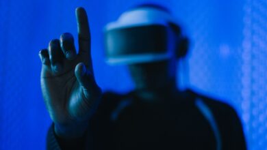 Close-up of a person in a VR headset interacting, showcasing a modern technology setup.