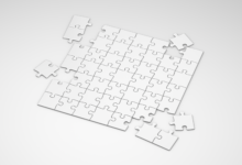 A top view of incomplete white puzzle pieces on a clean, minimalist background.