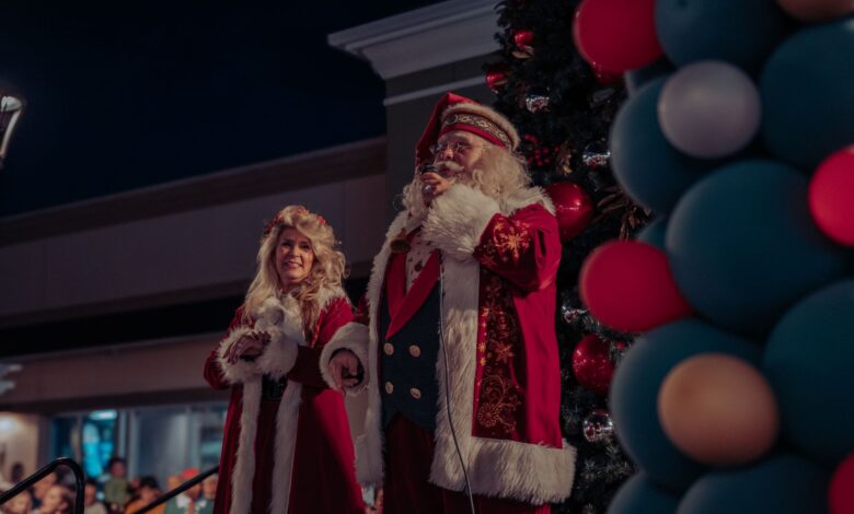 Santa and Mrs Claus spreading holiday cheer at a Christmas event.