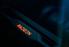 Detailed view of a glowing Radeon graphics card highlighting its hardware design.