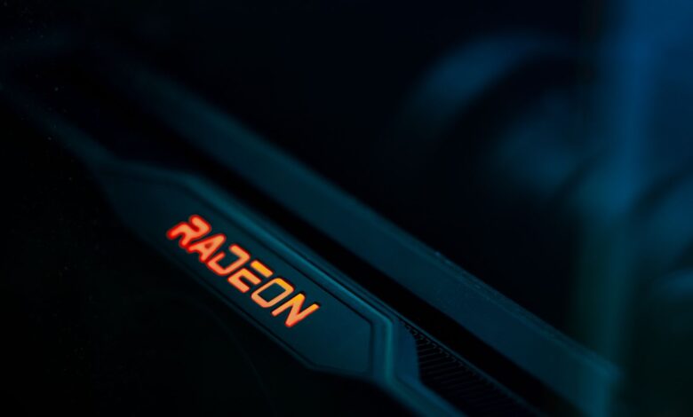 Detailed view of a glowing Radeon graphics card highlighting its hardware design.