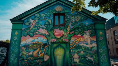 Colorful mural on a house facade in Christiania, Copenhagen, Denmark.