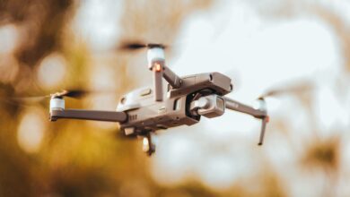 Close-up view of a high-resolution drone in flight with blurred background showcasing advanced technology.