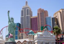 Iconic Las Vegas skyline featuring New York-New York Hotel with replica Statue of Liberty.