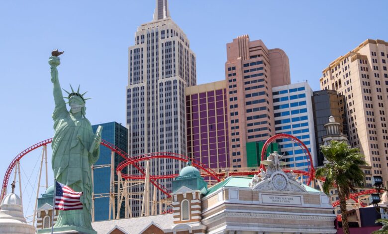 Iconic Las Vegas skyline featuring New York-New York Hotel with replica Statue of Liberty.