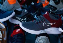 Diverse array of athletic shoes showcased in vibrant colors and various styles.