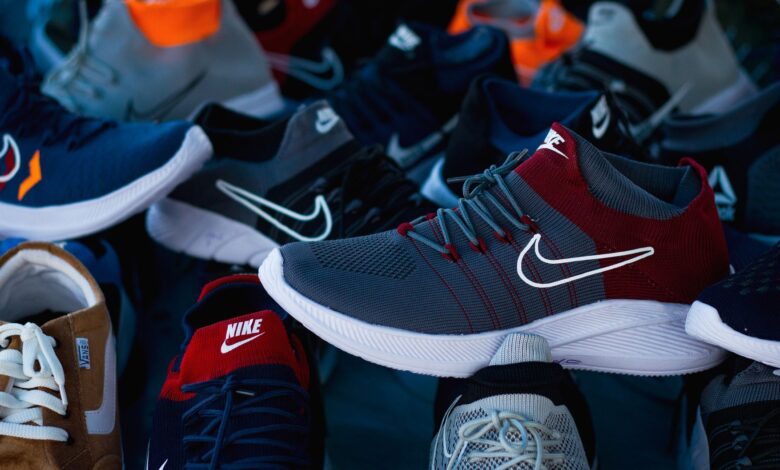 Diverse array of athletic shoes showcased in vibrant colors and various styles.