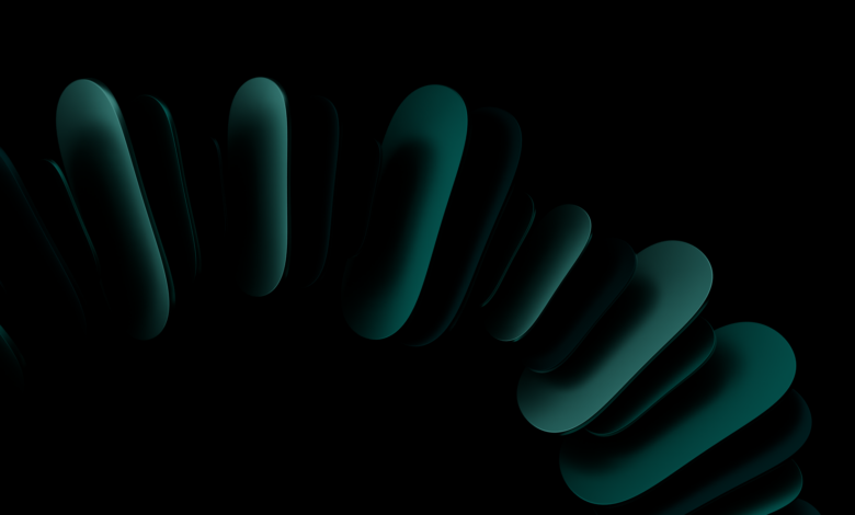 A striking abstract image with dark teal shapes forming a circular pattern on a black background.
