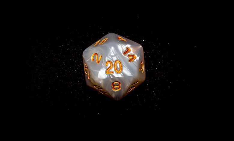 Close-up of a d20 die with glowing numbers against a dark background, symbolizing luck in role-playing games.