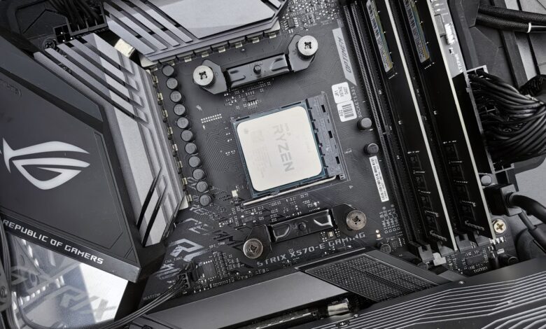Detailed view of a gaming motherboard, showcasing an AMD processor and components.
