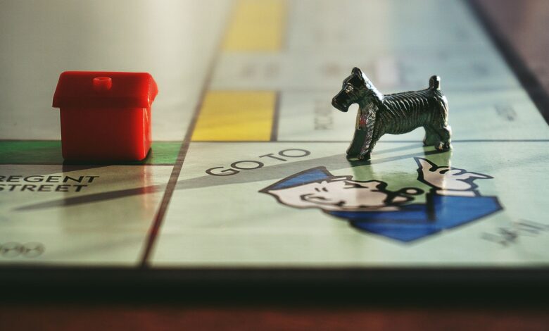 Detailed view of a Monopoly board with tokens on Regent Street.