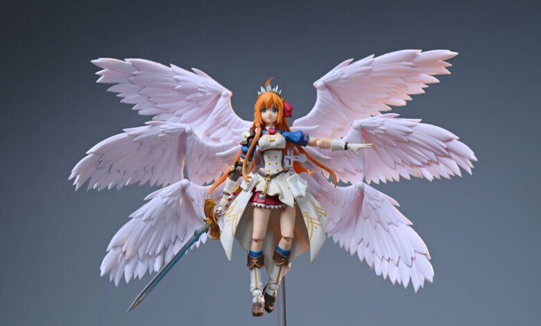 Detailed close-up of an anime figurine featuring a female warrior with wings.