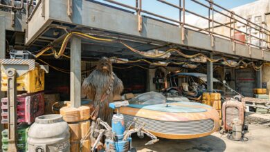 Explore a sci-fi junkyard filled with futuristic vehicles and equipment, perfect for industrial themes.