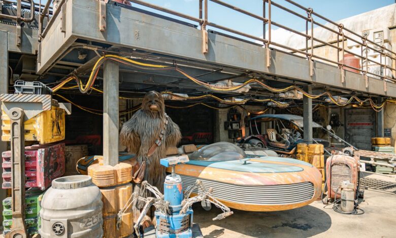 Explore a sci-fi junkyard filled with futuristic vehicles and equipment, perfect for industrial themes.