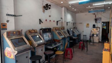 A nostalgic view of a vintage arcade room with classic gaming machines in Taipei, Taiwan.