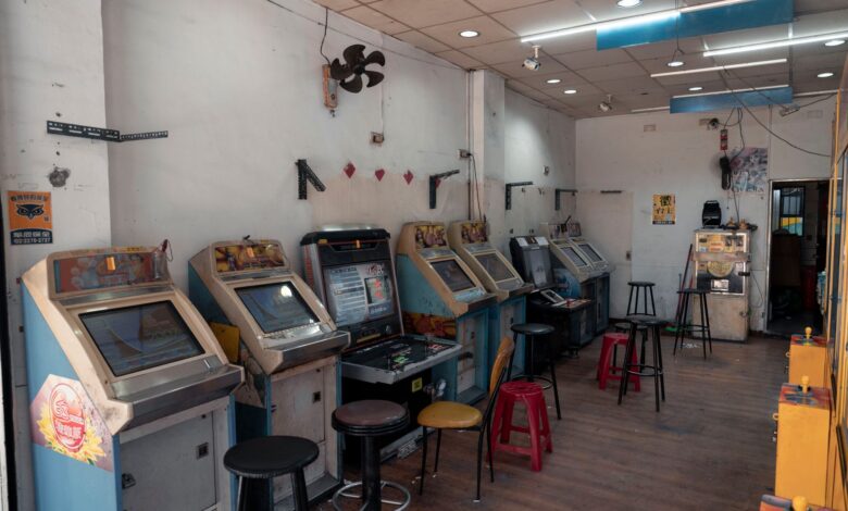 A nostalgic view of a vintage arcade room with classic gaming machines in Taipei, Taiwan.