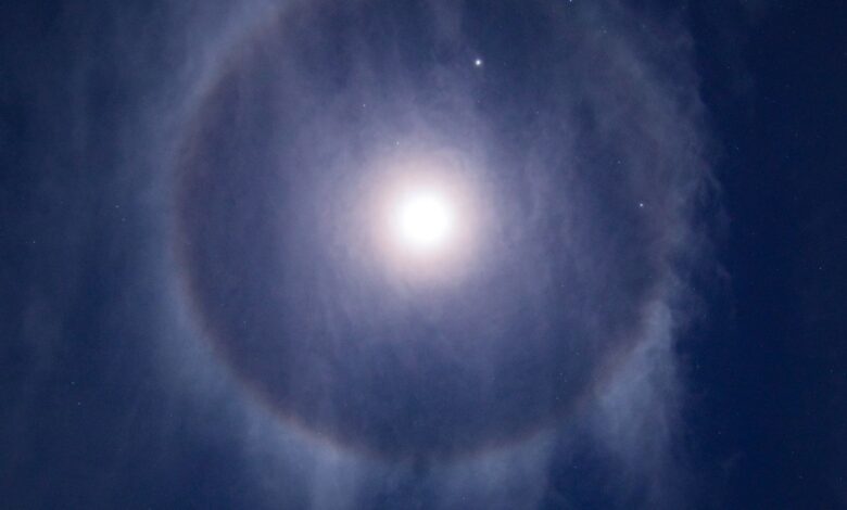 Stunning view of a moon halo surrounded by stars in Kandiāro, Sindh, Pakistan's night sky.