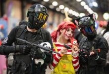 Colorful cosplay costumes at a lively anime convention in San José, Costa Rica.