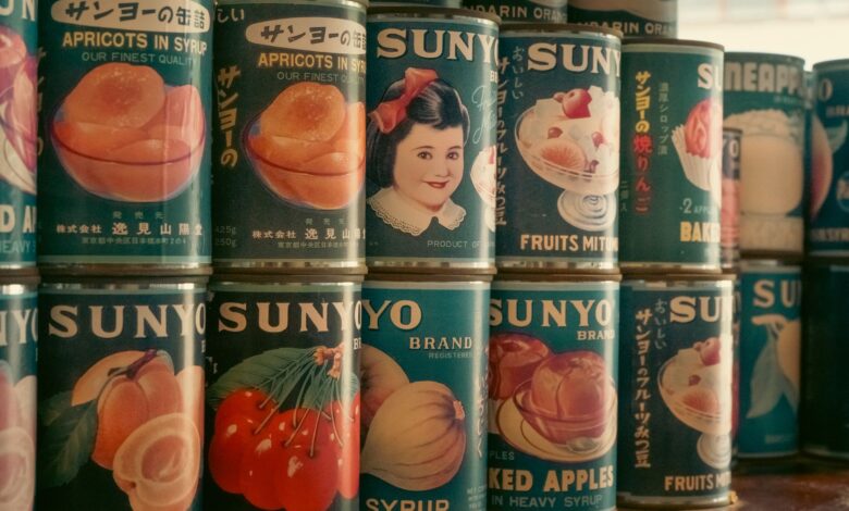 Nostalgic display of vintage Japanese SUNYO brand canned fruits. Perfect for retro and vintage-themed projects.