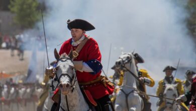 Dramatic cavalry charge during a historic military reenactment in Almansa, Spain.
