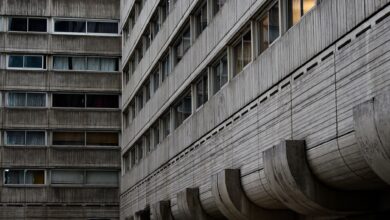 Close-up view of a brutalist concrete building facade showcasing geometric design and pattern.