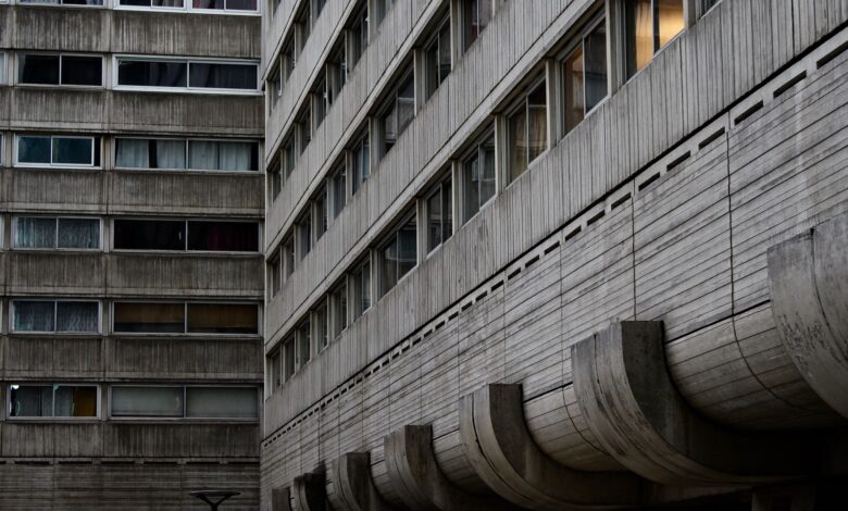 Close-up view of a brutalist concrete building facade showcasing geometric design and pattern.