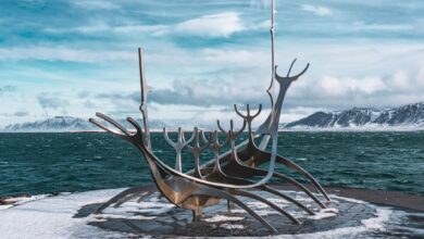 The iconic Sun Voyager sculpture on Reykjavik's snowy shore during winter.