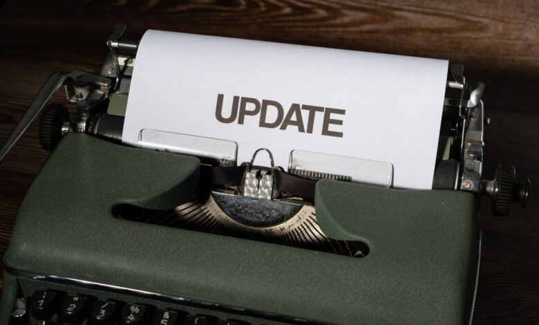 A close-up of a classic typewriter with a sheet displaying 'UPDATE' text, evoking nostalgia.