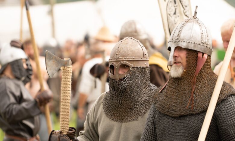 Men in Viking armor participate in a reenactment event in Szczecin, Poland.