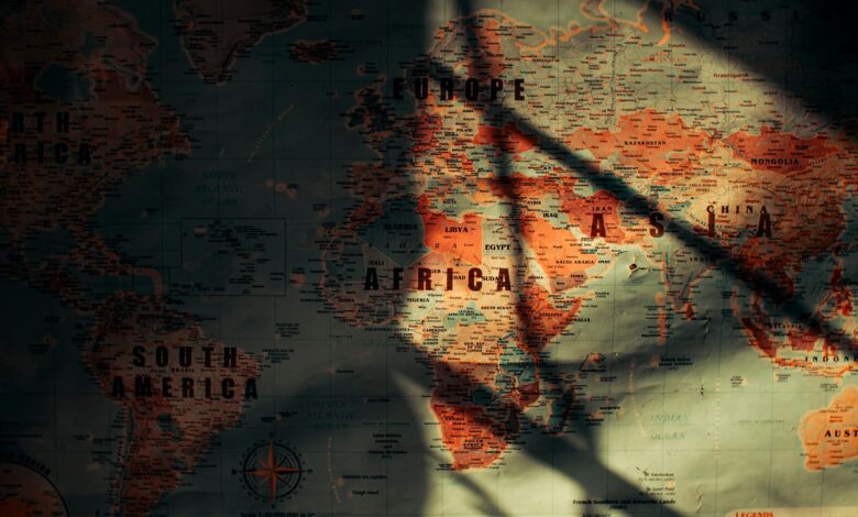 From above of sunlit aged paper world map with continents countries and oceans