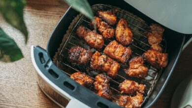 Delicious crispy chicken pieces cooked perfectly in a modern air fryer, ready to serve.